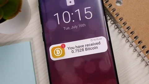 Receiving Bitcoin Notification on a Smartphone Screen 스톡 동영상 122014309