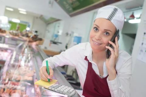 Receiving call from a client Stock Photos