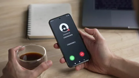 Receiving call from unknown person or Scammer, Online crime concepts Stock Footage 320468998