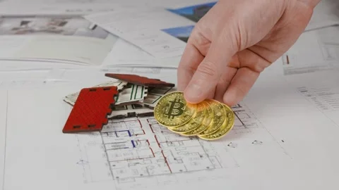 Receiving an insurance payout in cryptocurrency Stock Footage 305636367