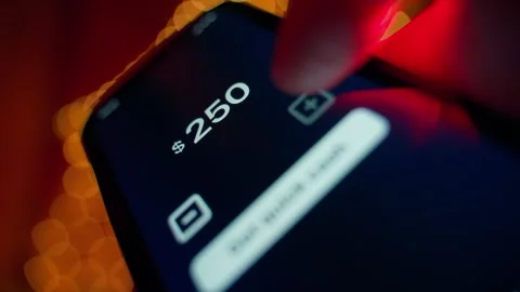 Receiving money through a mobile app. A fictional app for quick money loans Video stock 309115525