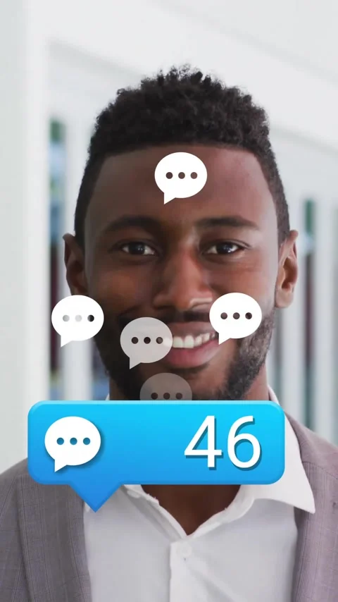 Receiving multiple chat notifications, man in office smiling at animation on Stock Footage 344285182