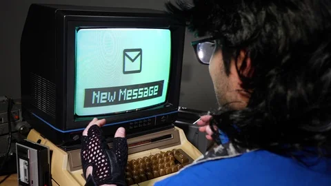 Receiving a New Message on a Vintage Old Computer from the 70s 80s Stock Footage 126473391