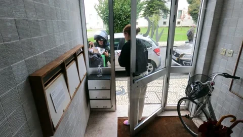 Receiving order from food delivery application uber eats glovo yandex parcel Stock Footage 229333835