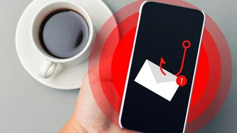 Receiving a scam call SMS on a smartphone while holding a cup of coffee Stock Photos