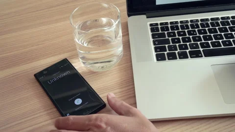 Receiving an unwanted phone call during working time. Stock Footage 212369622