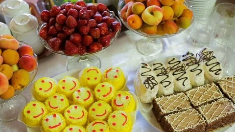 Reception table decoration fruit, cacke, champagne Stock Footage 82948653