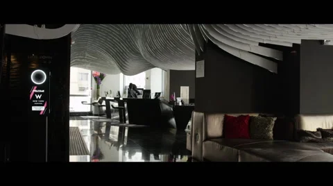 Receptionist at desk of nice lounge Vidéo 57095968