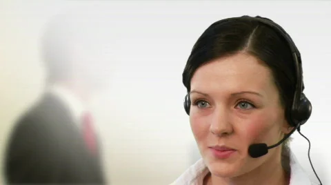 Receptionist talking Stock Footage