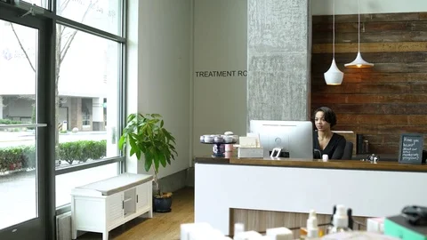 Receptionist working in a spa Stock Footage 83398160
