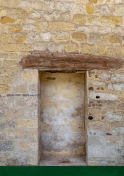 Recessed frame in an old stone bricks wall Stock Photos