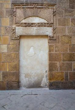 Recessed frame in an old stone bricks wall Stock Photos