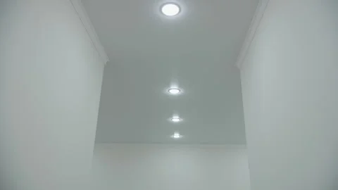 Recessed lamps in the stretch ceiling Stock Footage 265615023