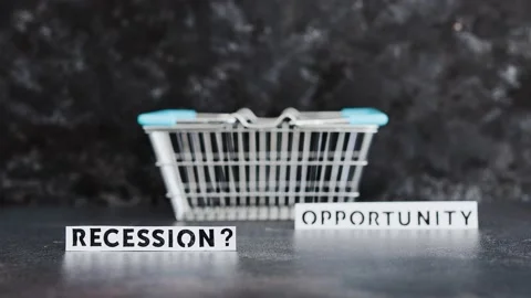Recession or opportunity texts wth shopping basket with focus switching betwe Stock Footage 201855587