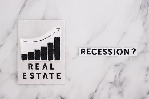 Recession text with question mark next to real estate stats going up, post pa 스톡 사진