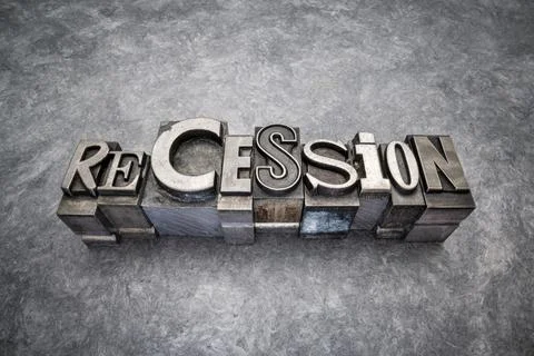 Recession word abstract in gritty vintage letterpress metal type Stock Photos
