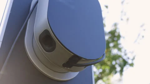 Recharge fuel technology with cable to power battery. Electric car charge. Power Stock Footage 249885518