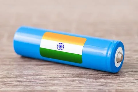 Rechargeable battery with flag of India on table Stock Photos