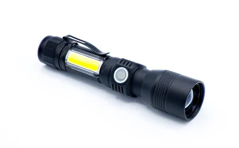 Rechargeable battery powered flashlight isolated on white background.   bla.. Stock Photos