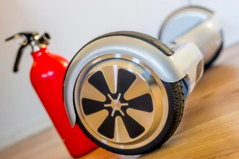 Recharging hoverboard Stock Photos