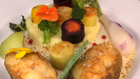 Recipe of cod steak, mashed potatoes and its farandole of vegetables, parsnip Stock Footage 230439044
