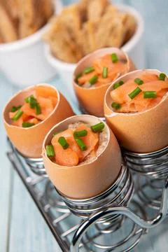 Recipe eggs casserole cooked in the shell with mushroom cream sauce and smoked 스톡 사진