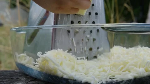 Recipe Fresh Cheese Grated by Hand for Homemade Tortilla with Garden Tomatoes Stock Footage 345169787