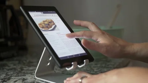 Recipe on Wi-Fi Tablet in Kitchen Stock Footage 79607070