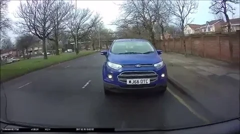 Reckless driver mounts pavement to get ahead of traffic Video stock 109261995