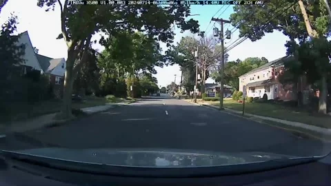 Reckless driver speeding &amp; cutting lane on a slow speed road, front &amp; rear view Stock Footage 279703049