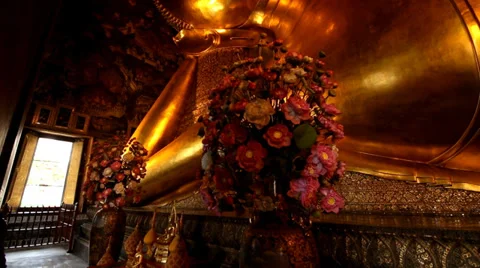 Reclining Buddha gold statue face. Stock Footage 36335916