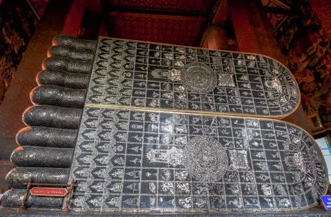 Reclining buddha gold statue face. wat pho, bangkok, thailand Stock Photos