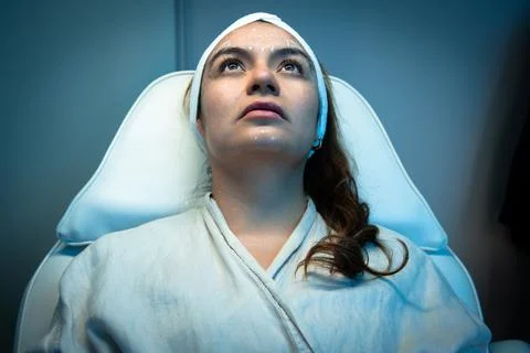 Reclining patient with white guide marks on face Stock Photos
