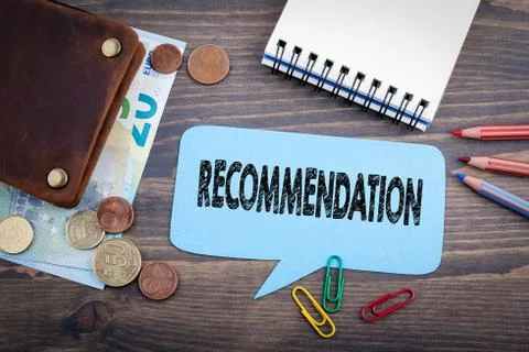 Recommendation concept. Speech Bubble on a dark textured wooden background Stock Photos