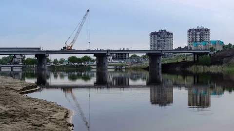 Reconstruction of a bridge over river. Timelapse Stock Footage 74343458