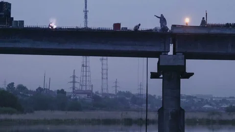 Reconstruction of a bridge over river. Timelapse Stock Footage 74347172