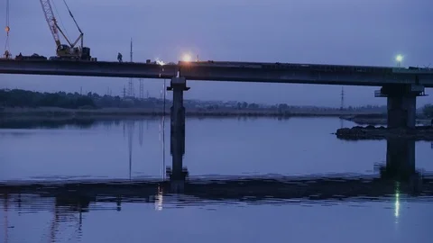 Reconstruction of a bridge over river. Timelapse Stock Footage 74350299