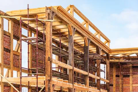 Reconstruction of an old building with a skeleton half-timbered structure Stock Photos