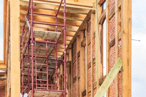 Reconstruction of an old building with a skeleton half-timbered structure, Stock Photos