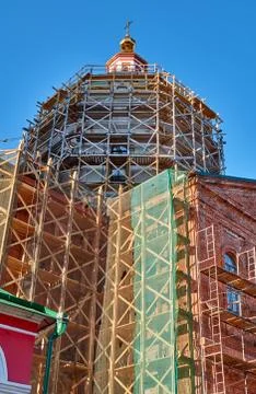 Reconstruction process of the orthodox cathedral using scaffolding Stock Photos
