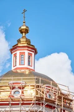 Reconstruction process of the orthodox cathedral using scaffolding Stock Photos