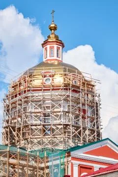 Reconstruction process of the orthodox cathedral using scaffolding Stock Photos