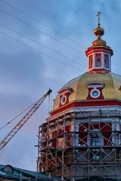 Reconstruction process of the orthodox cathedral using scaffolding Stock Photos