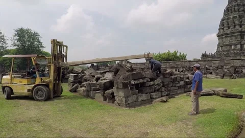 Reconstruction of ruined temples, Prambanan, Java, Indonesia Stock Footage 150505343