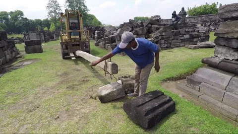 Reconstruction of ruined temples, Prambanan, Java, Indonesia Stock Footage 150544552