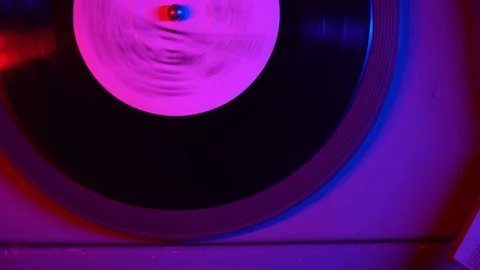 A record being played on a retro turntable that plays vinyl vintage records Stock Footage 121312712