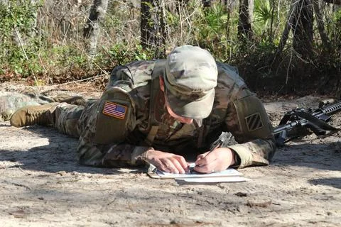 RECORD DATE NOT STATED  A 3rd Infantry Diision Soldier plots his coordinat... Stock Photos