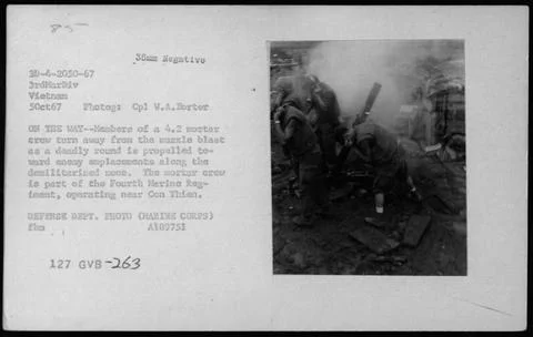 RECORD DATE NOT STATED  A 4.2 mortar crew from the Fourth Marine Regiment ... Stock Photos