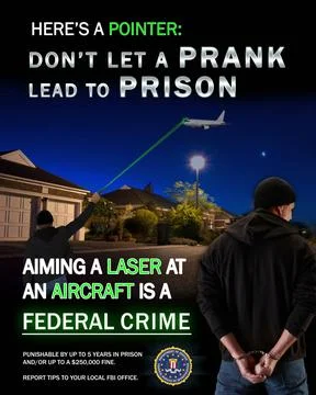 RECORD DATE NOT STATED Aiming a laser pointer at an aircraft -- military, ... Stock Photos