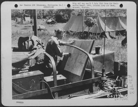 RECORD DATE NOT STATED An Air Support Party Officer preparing his maps for... Foto stock